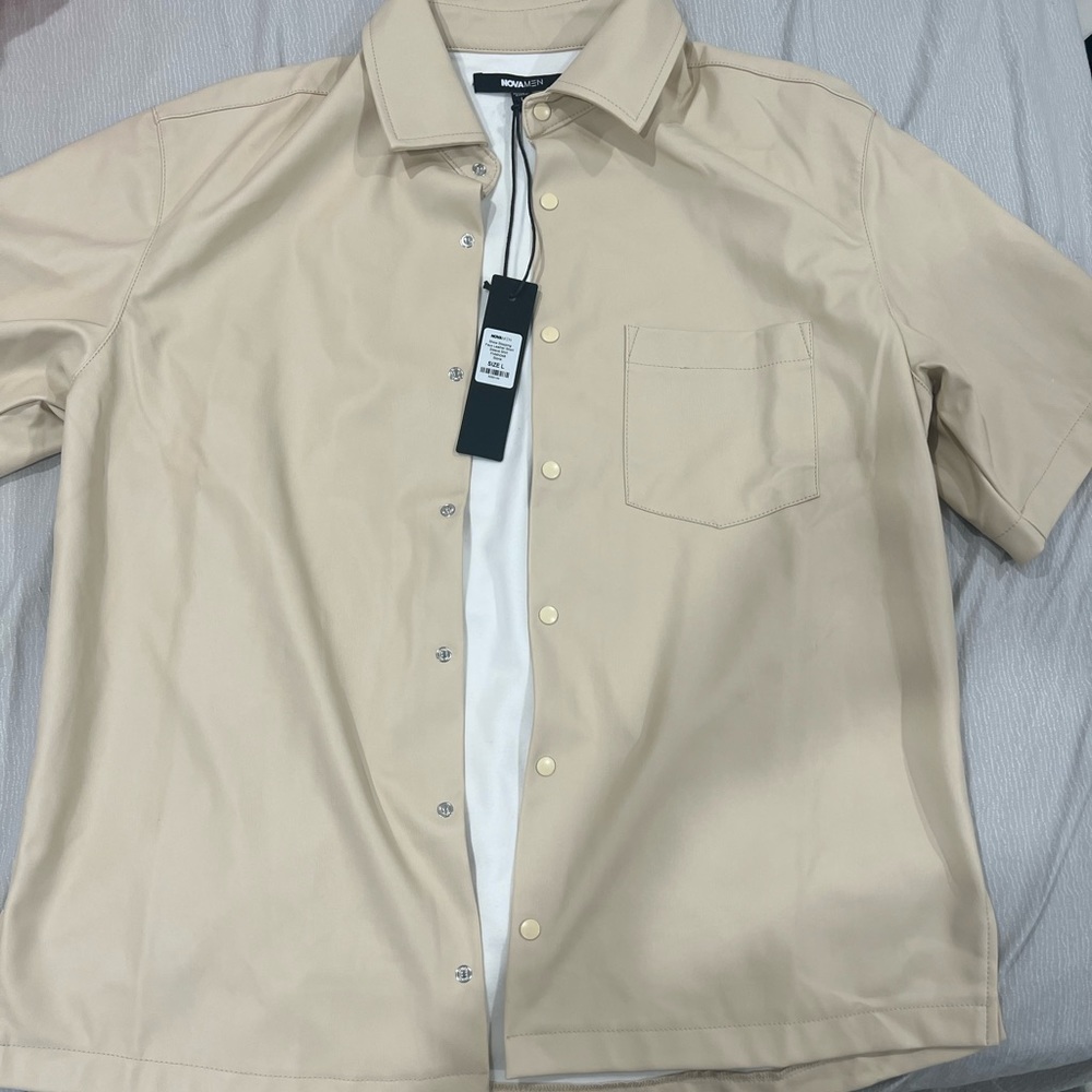 Beige leather shirt never been worn